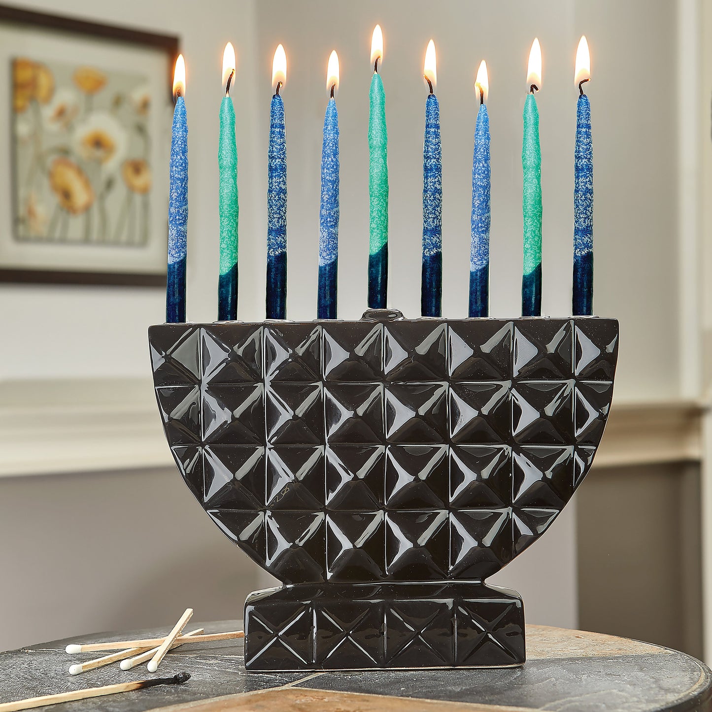 Close up candles burning from a Hanukkiah