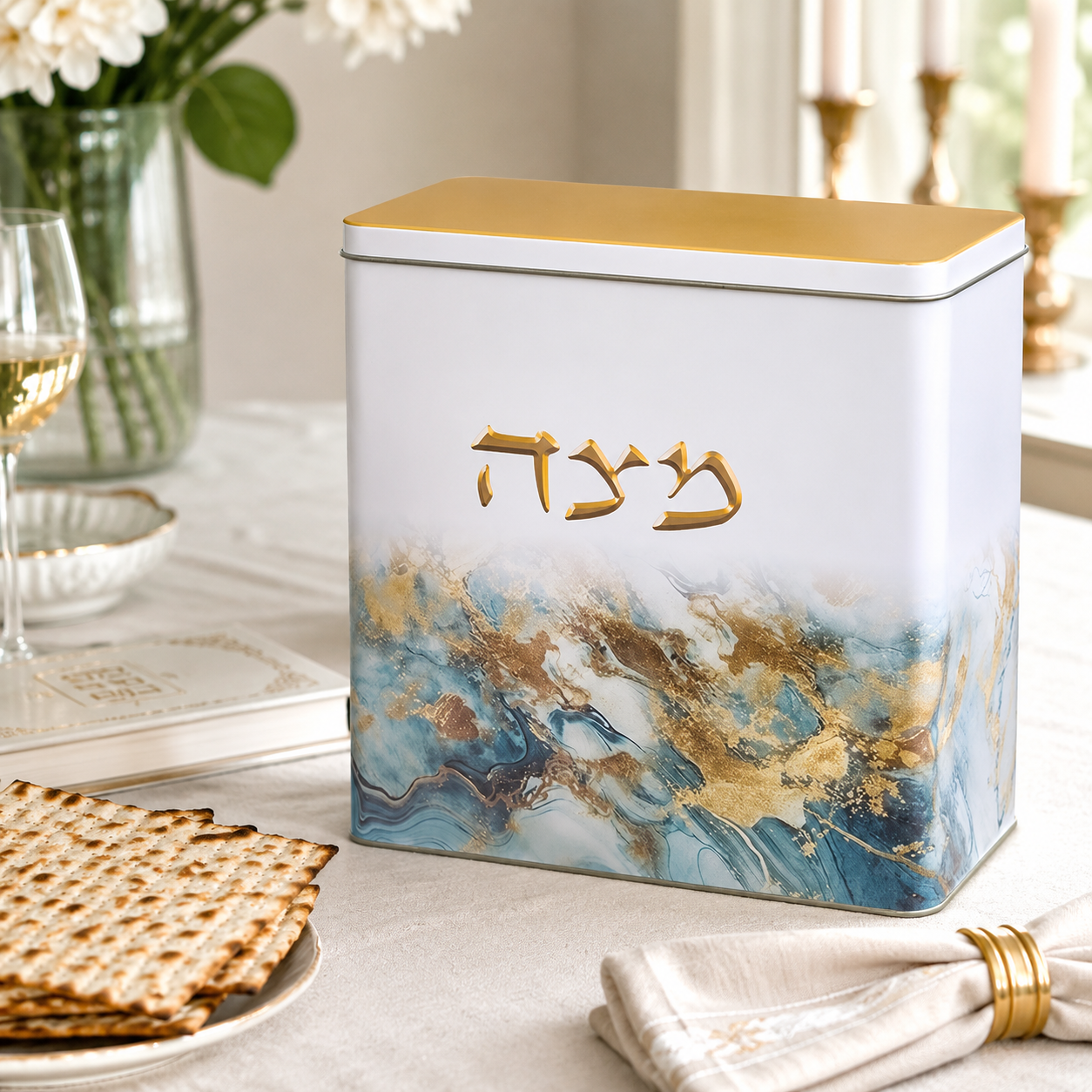 Blue marble matzah box displayed on Passover table with matzah