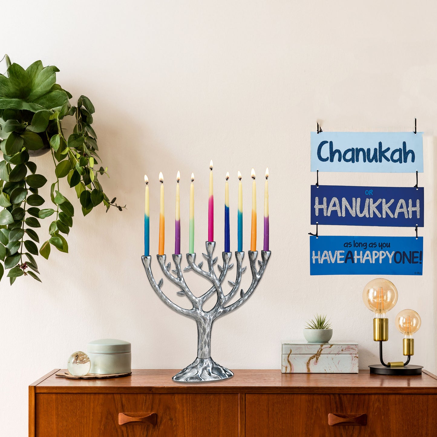 Aluminum tree of life menorah displayed on a sideboard in a home setting
