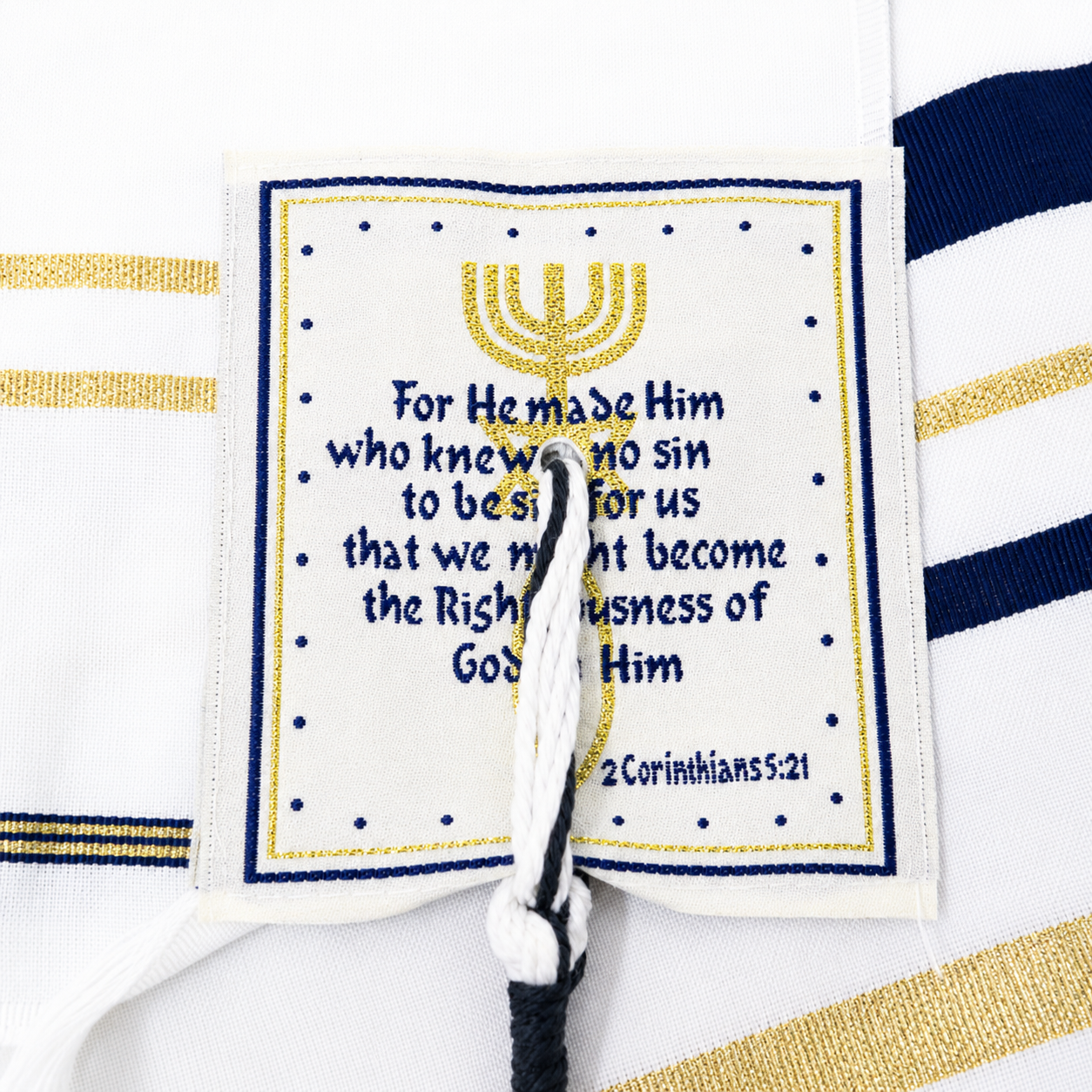 Navy blue and gold tallit corner patch with Scripture reference