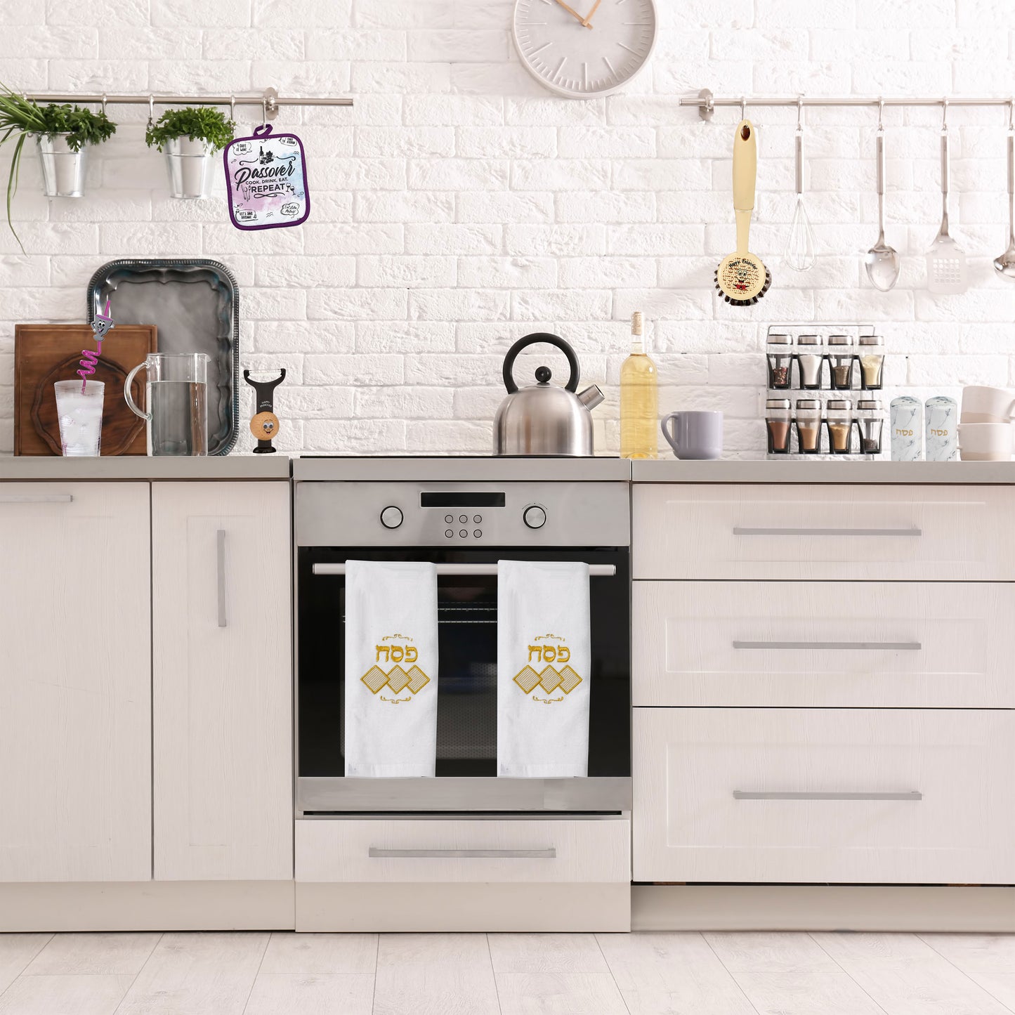 White velour hand towel displayed in a kitchen setup