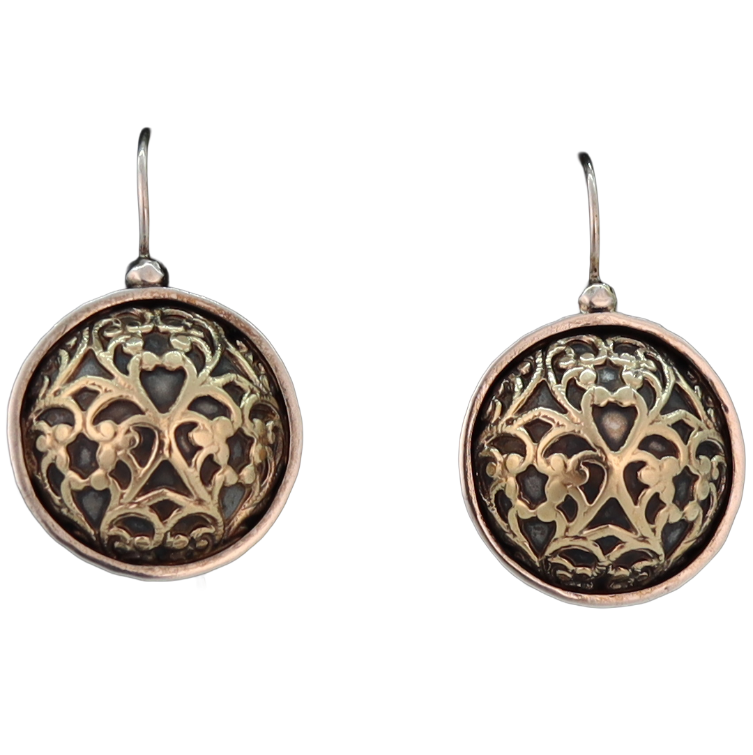 Round dome shaped earrings with gold pattern over black