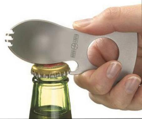 grub n tool being used to open a bottle cap