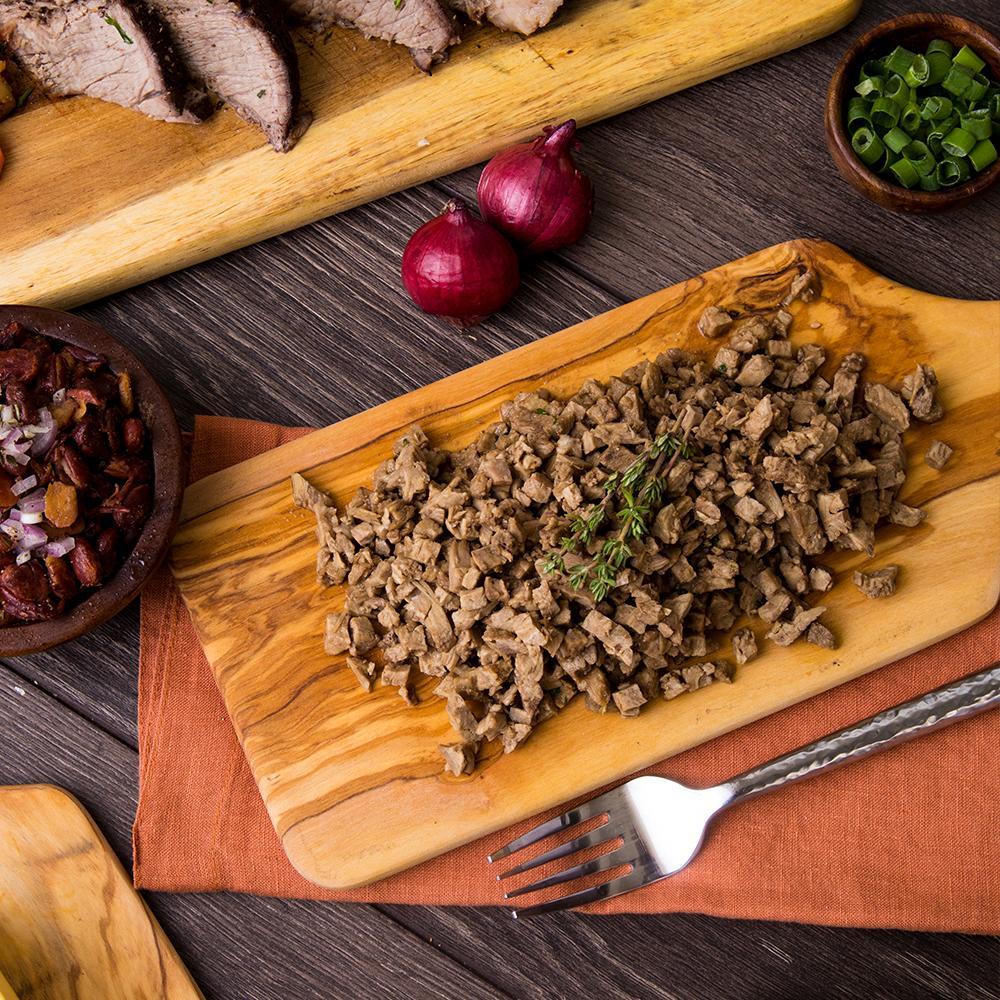 ready hour mega protein kit diced beef on cutting board with fork and various veggies
