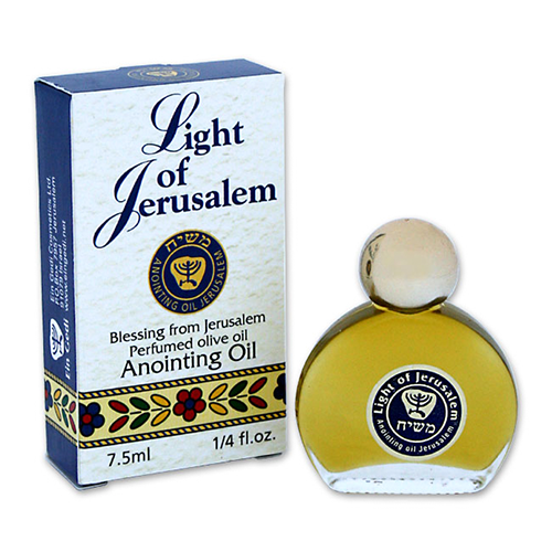 A bottle of Ein Gedi Light of Jerusalem Anointing Oil with its packaging box. The bottle is clear and circular with a gold-colored cap