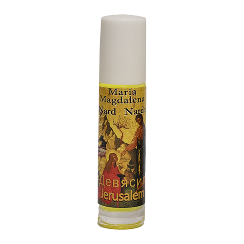 A bottle of Nard Anointing Oil with a label featuring an illustration of Mary Magdalene and text.