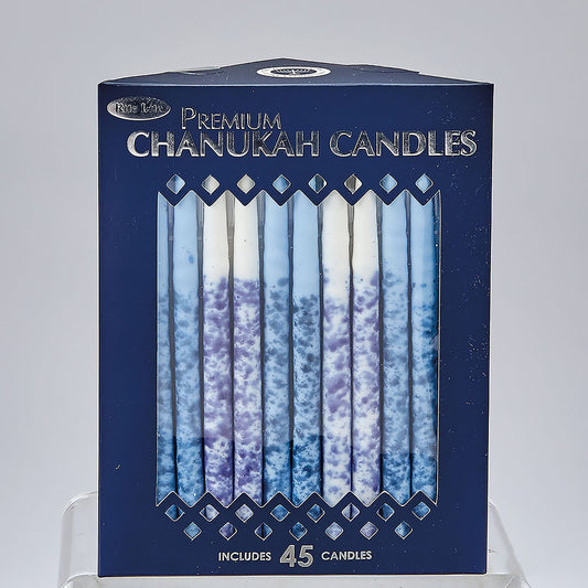 Dark blue box of light blue, white, and purple candles