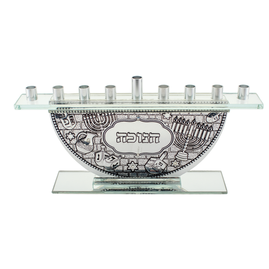 Glass hanukkiah with silver branches and a design on the front that includes dreidels and hanukkiahs