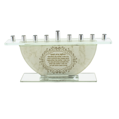 Glass hanukkiah with silver branches and a Hanukkah blessing on the back