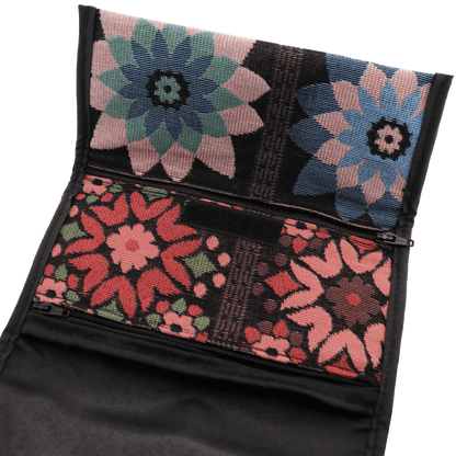 Black clutch/crossbody purse with a traditional Beduin floral lattice pattern