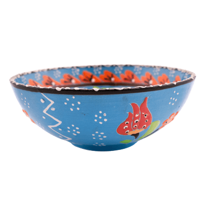 Light blue ceramic bowl with a multicolored floral design