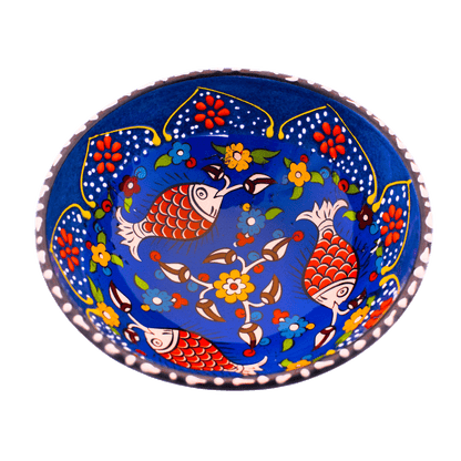 Blue ceramic bowl with a floral design with fishes