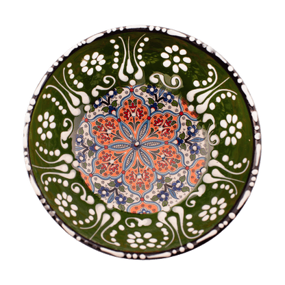 Handmade green and orange Middle Eastern-style ceramic bowl with an intricate floral design