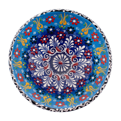 Handmade light blue and red Middle Eastern-style ceramic bowl with an intricate floral design