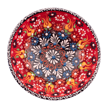 Handmade red and blue Middle Eastern-style ceramic bowl with an intricate floral design