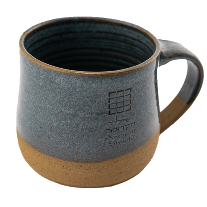 Handcrafted blue ceramic mug