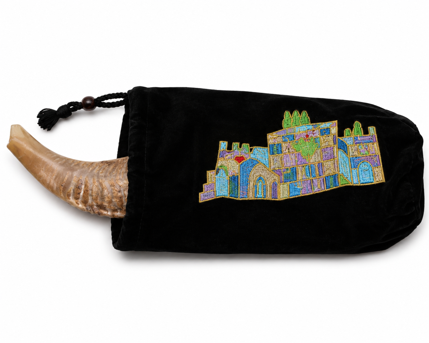 Black velvet ram's horn shofar bag with embroidered Jerusalem design and natural ram's horn shofar on white background