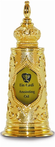 Decorative gold bottle of Ein Gedi Anointing Oil on a white background