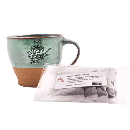 Seafoam-green ceramic mug with a 5-pack bag of Japanese green tea