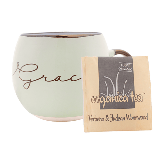 Pastel green mug with 1 bag of Verbena and Judean wormwood tea