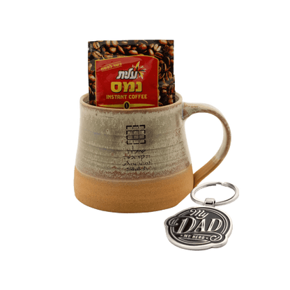 Tan ceramic mug with a keychain and 4 bags of Israeli instant coffee