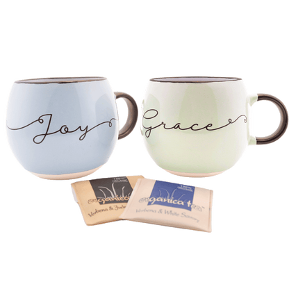 1 pastel blue and 1 pastel green mug with 8 bags of tea