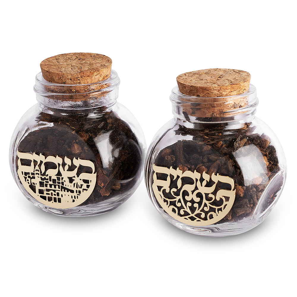 Round glass Besamim spice holders with cloves and gold Hebrew plaque