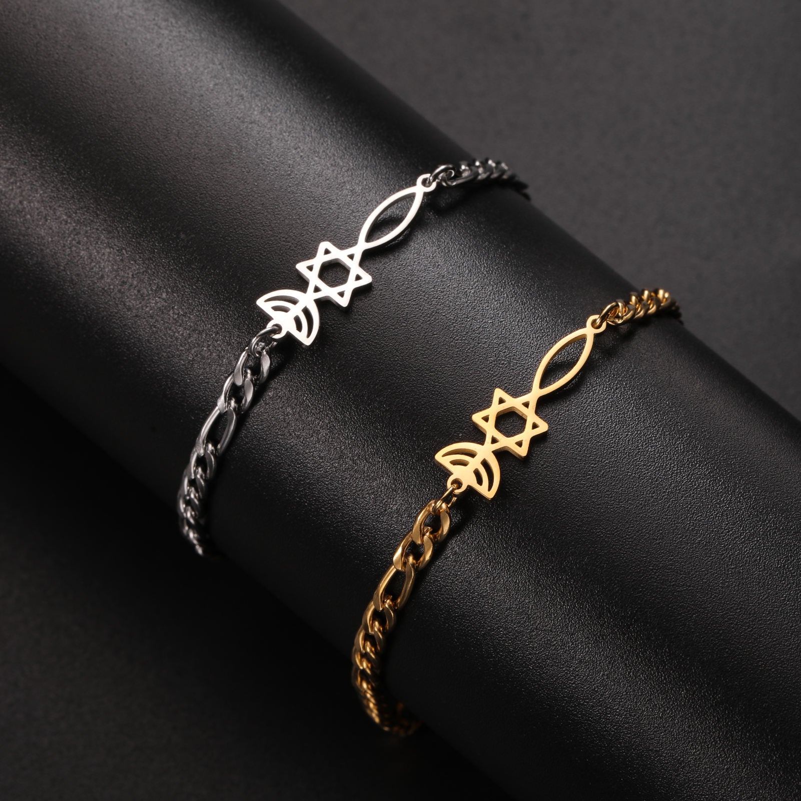 Gold and silver Grafted In bracelets with menorah, Star of David, and Christian fish centerpiece