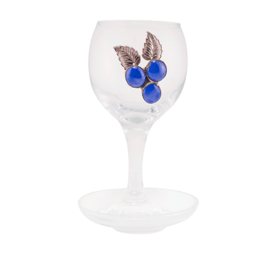 Clear glass Kiddush cup decorated with blue glass beads that resemble a cluster of grapes