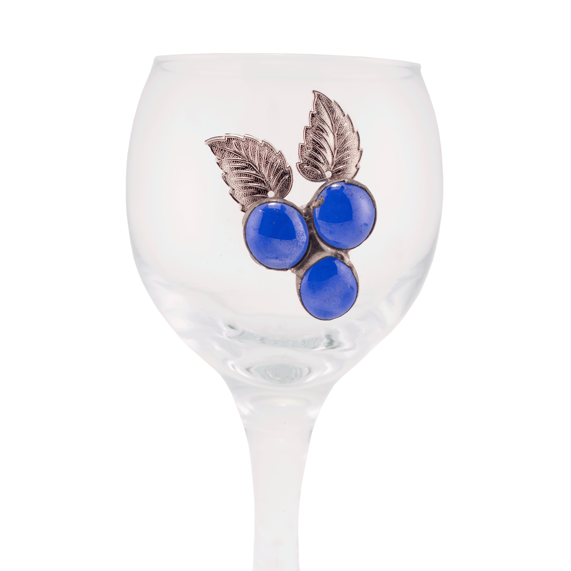 Clear glass Kiddush cup decorated with blue glass beads that resemble a cluster of grapes