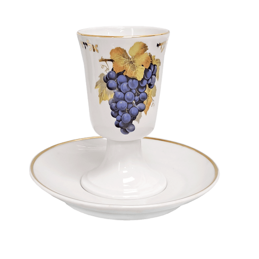 White porcelain Elijah cup decorated with a cluster of grapes