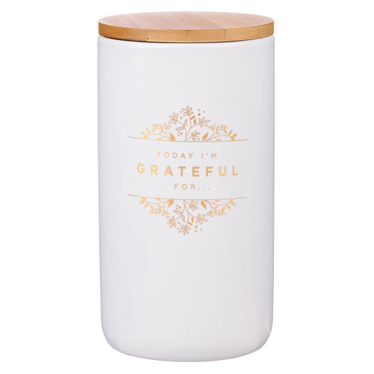 White jar with a wooden lid and 'Today I'm Grateful For' text in gold.