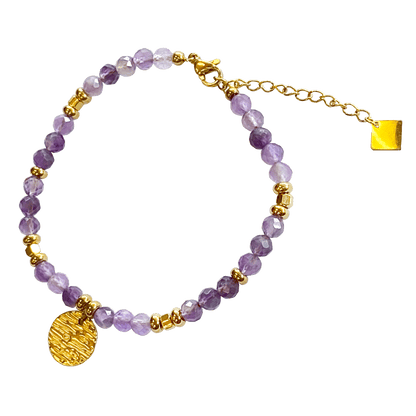 Amethyst stone bracelet interspersed with gold-plated beads with a gold-plated charm