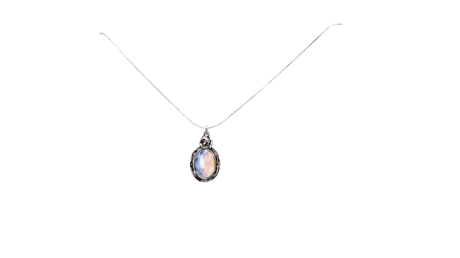 Selenite Stone Oval Necklace with Silver flower at top of pendant, on a silver chain