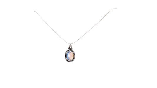 Selenite Stone Oval Necklace with Silver flower at top of pendant, on a silver chain