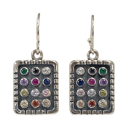 Sterling silver dangle earrings with twelve different colored stones on a breastplate-shaped pendant