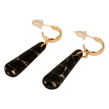 Handcrafted black teardrop earrings made of marbled polymer clay with gold hardware