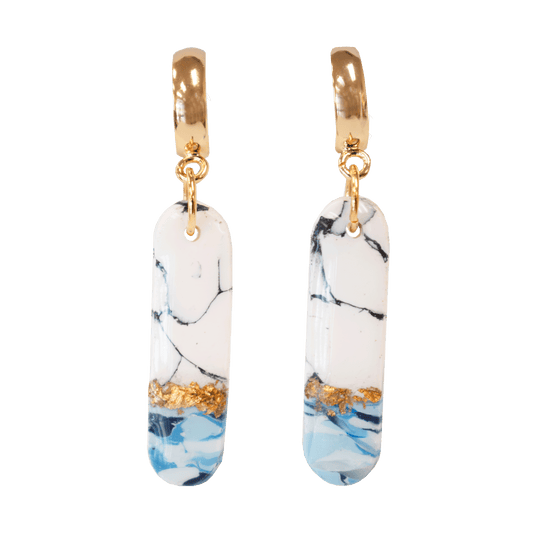 Handcrafted white and blue teardrop earrings made of marbled polymer clay with gold hardware