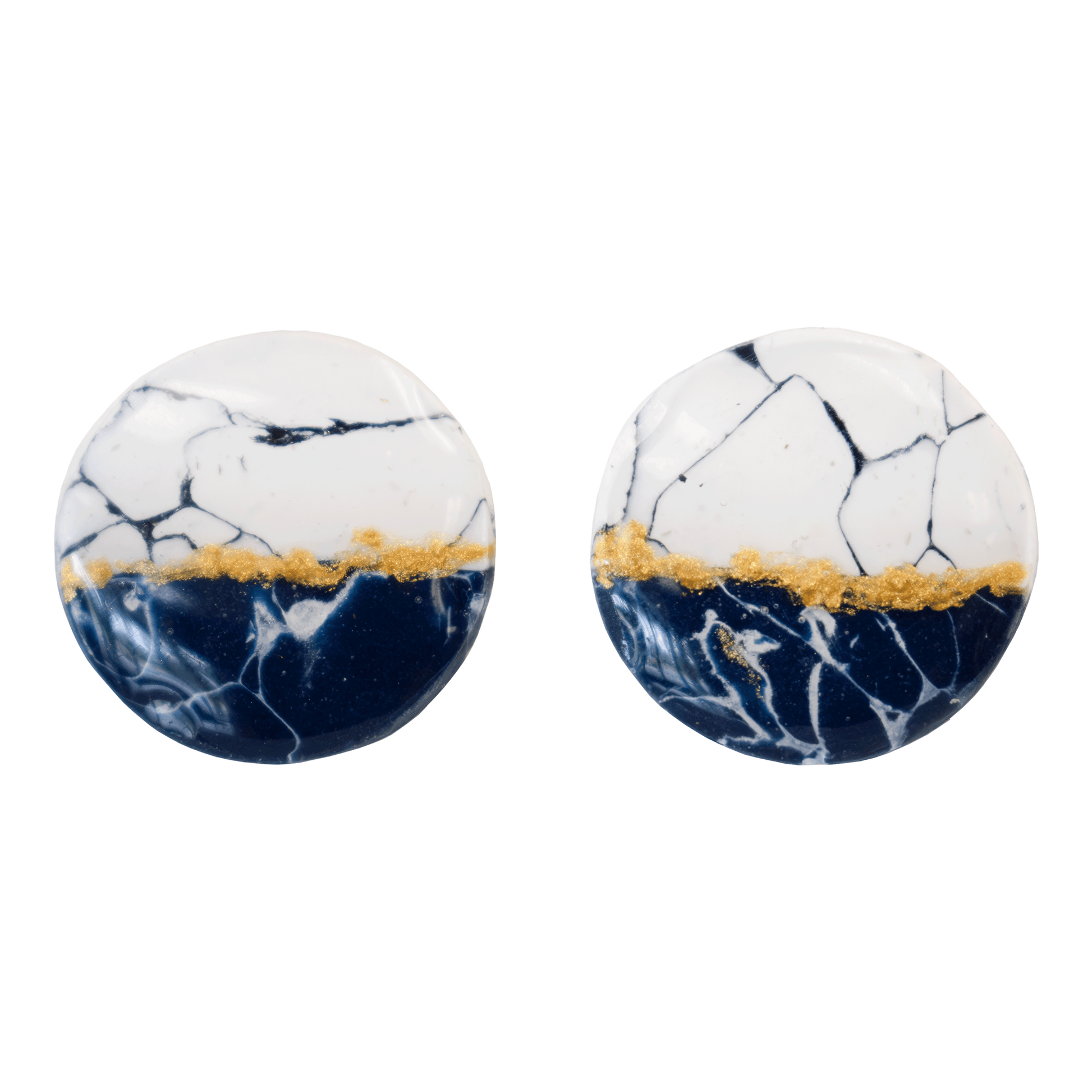 Circular white and navy blue stud earrings made of marbled polymer clay