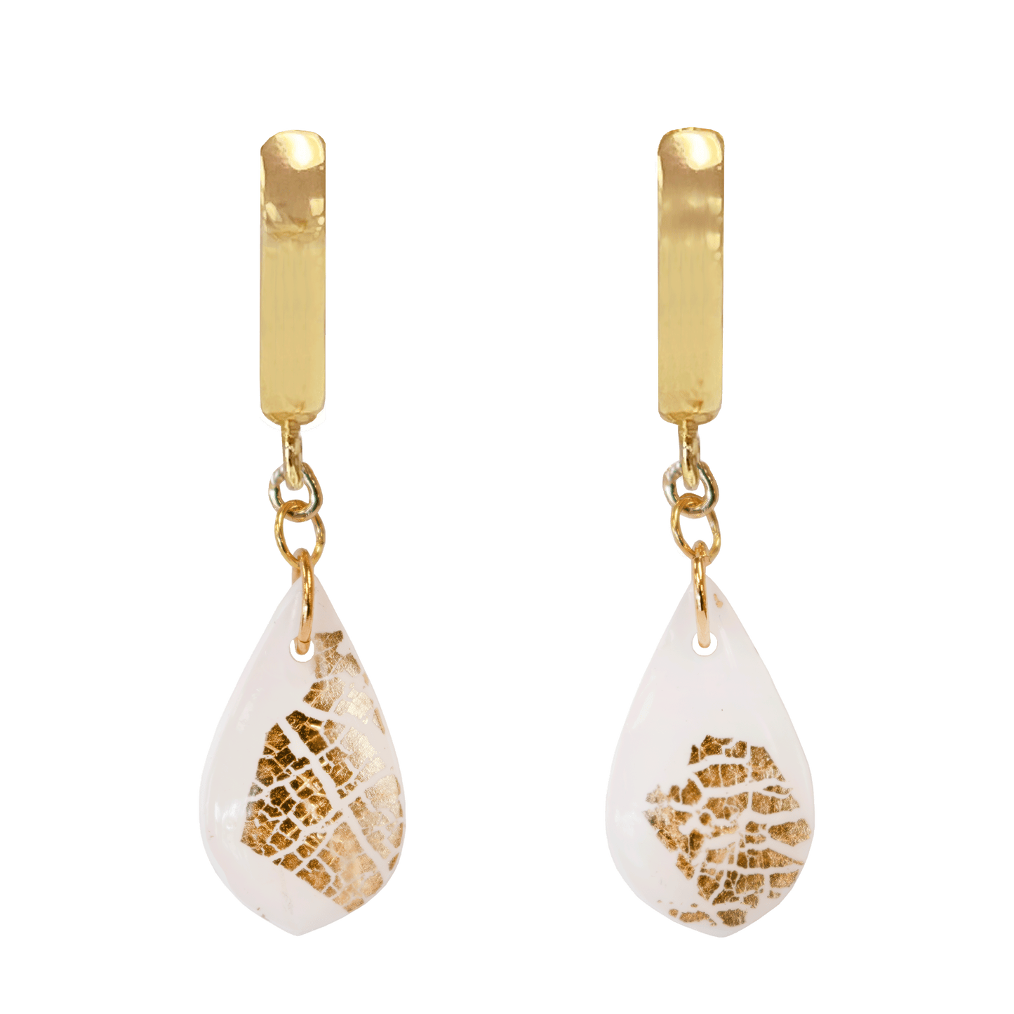 Gold-plated hoop earrings with a white polymer clay teardrop accented with gold foil suspended from the hoop