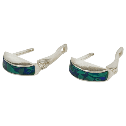 Sterling silver huggie hoop earrings displaying cuts of Eilat stone