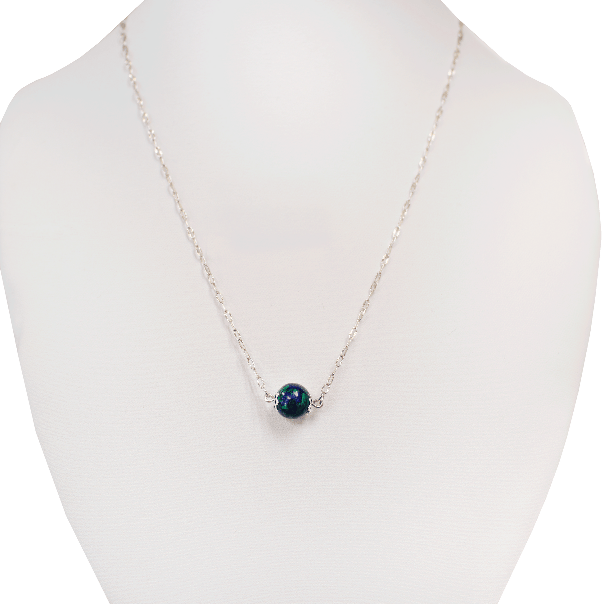 Eilat stone necklace with a beautiful large Eilat stone bead suspended on both sides by an oval link chain made of sterling silver with rhodium