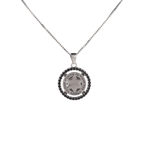 Circular pendant with black crystal surrounding a Hebrew blessing with the star of David in the center