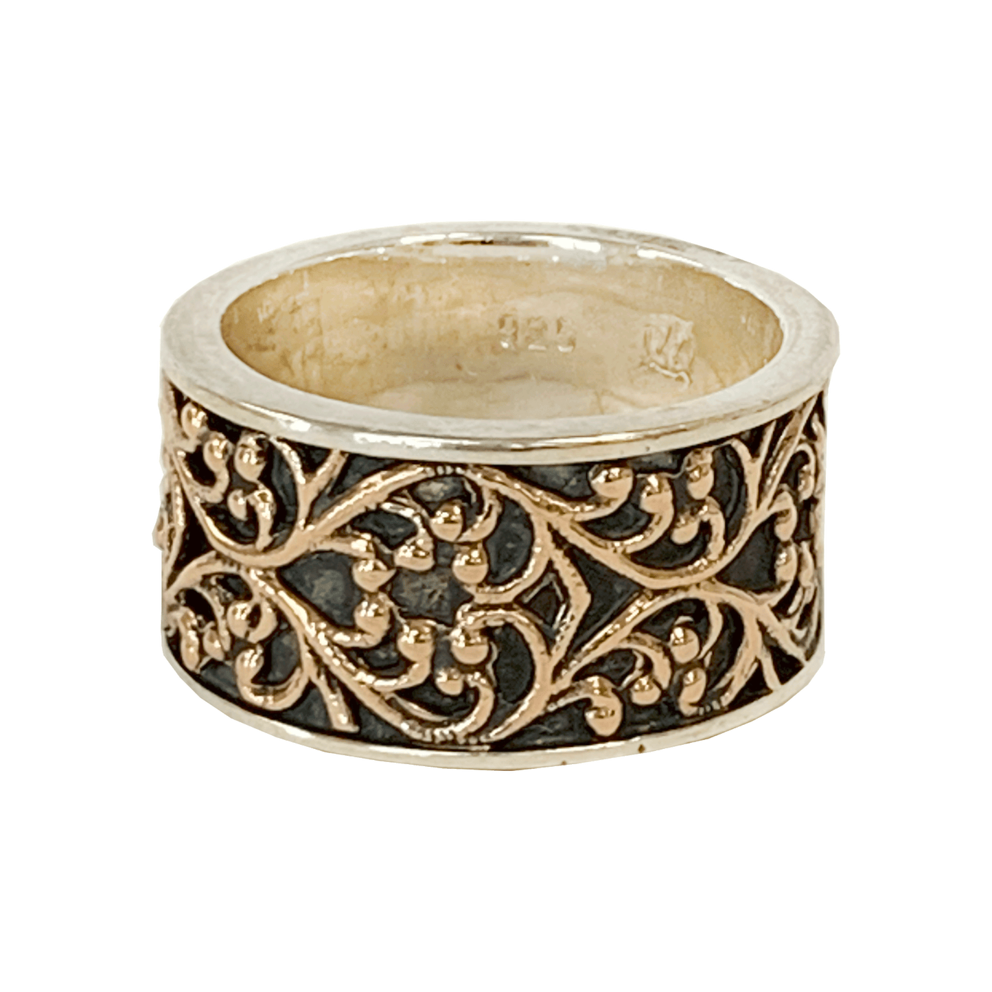 Sterling silver wide ring with a 14-karat rose gold filigree pattern