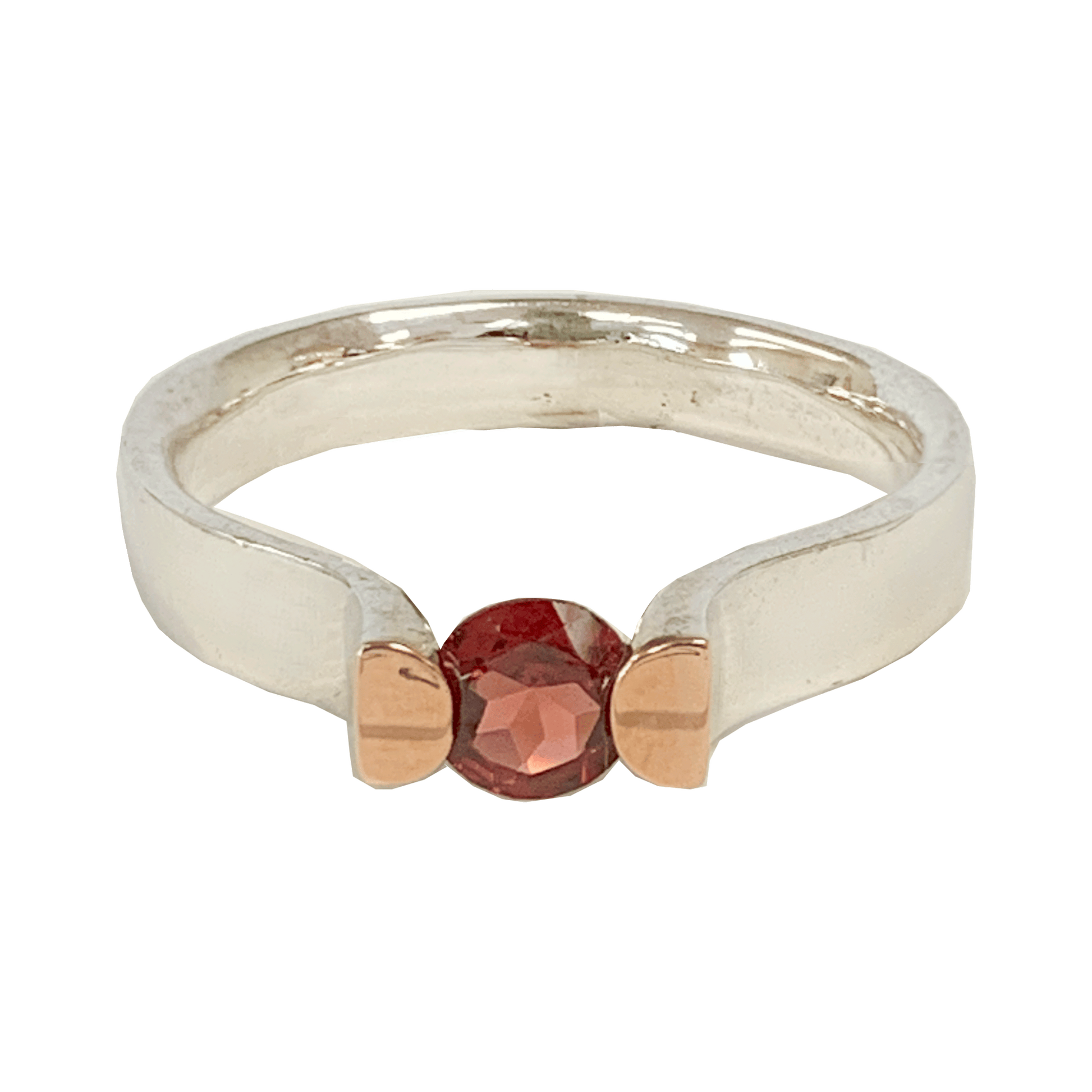 Sterling silver ring with a garment at its pinnacle