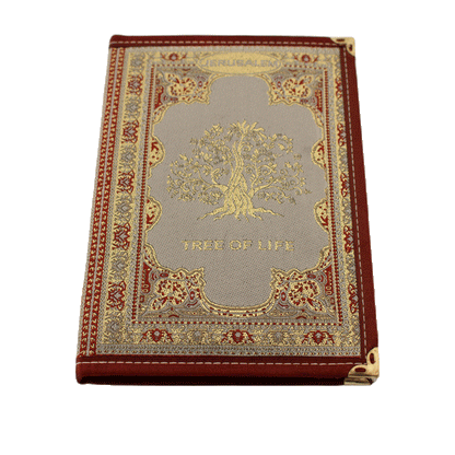 Gray notebook with gold and red stitching and a Tree of Life on the front and back