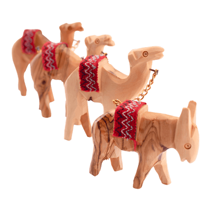 Handcarved animal caravan set with a donkey and three camels made of olive wood