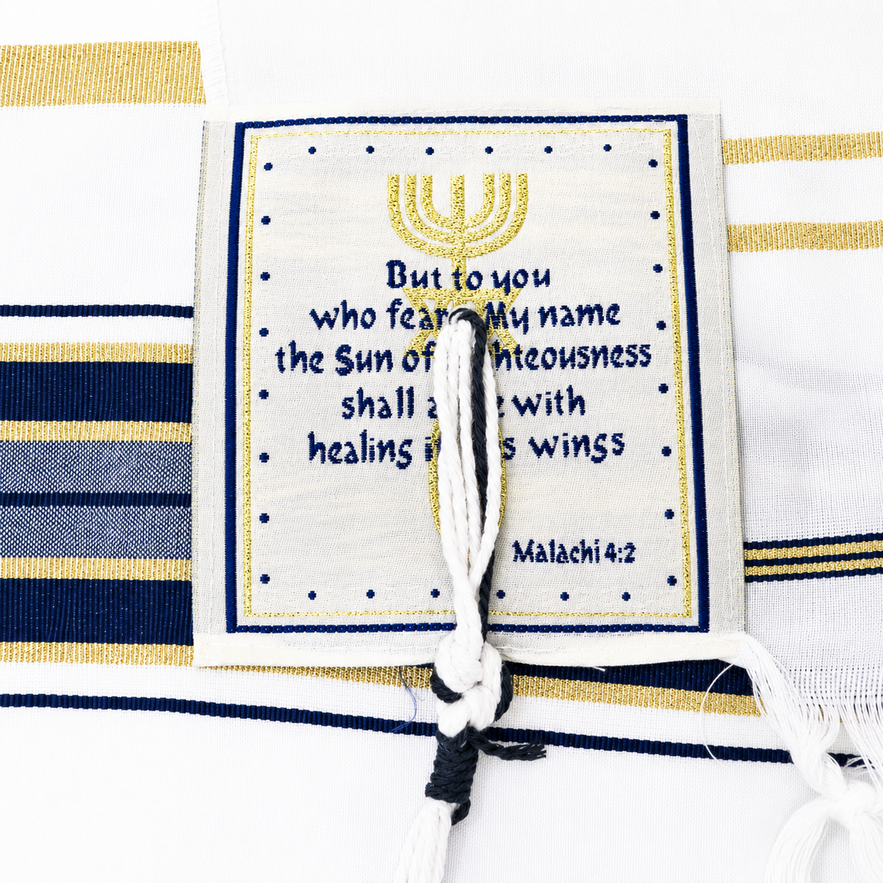 Navy blue and gold tallit corner patch with Scripture reference