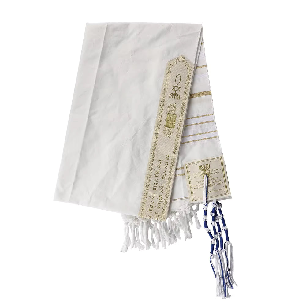 Folded white and gold tallit prayer shawl