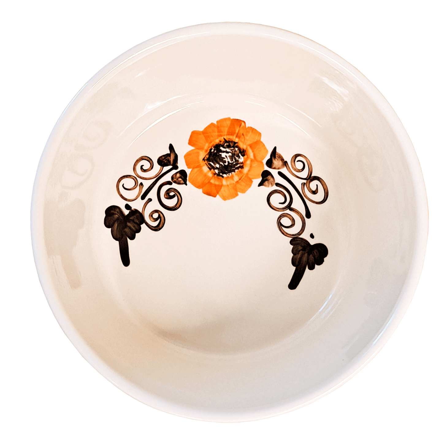 Soft white serving bowl made of Lapid stoneware with an orange and brown floral design in the bottom of the dish